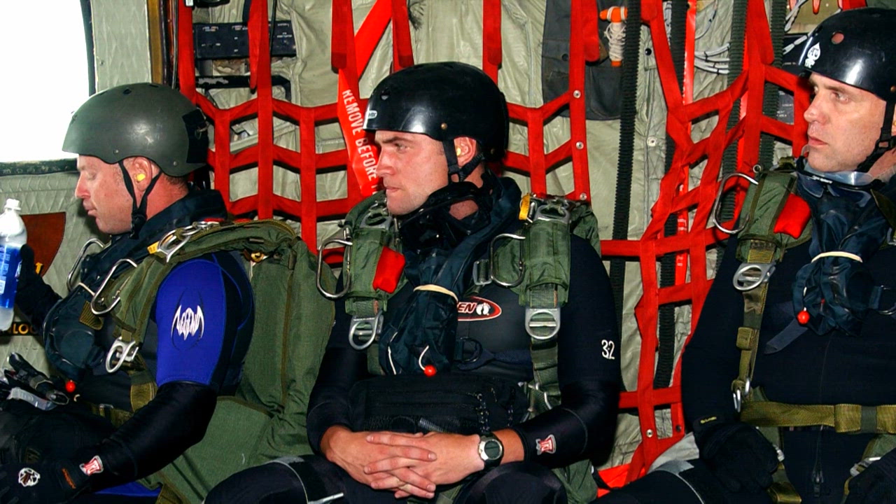 A Helmet, a Zippo, a Fuel Bladder, and a Simulated IED